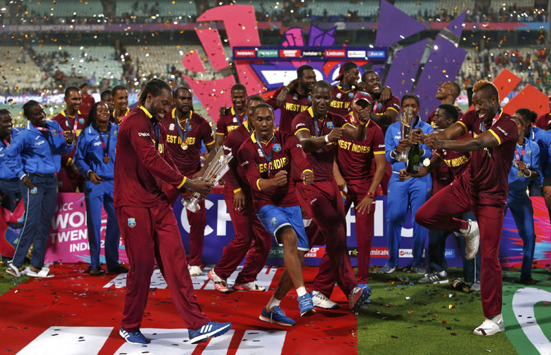 Cricket - England v West Indies - World Twenty20 cricket tournament final - Kolkata, India - 03/04/2016. West Indies players celebrate with the trophy after winning the final.   Photo: reuters