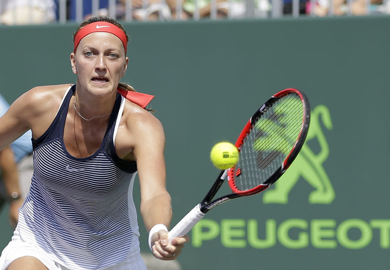 Petra Kvitova, of the Czech Republic, returns to Ekaterina Makarova, of Russia, during the Miami Open tennis tournament in Key Biscayne, Florida, on Saturday, March 26, 2016. Photo: AP