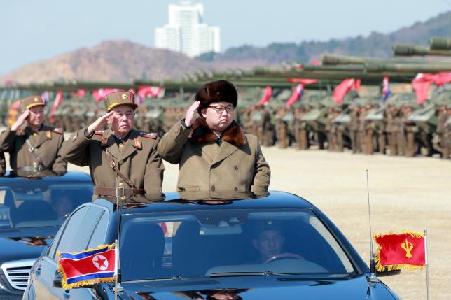 North Korean leader Kim Jong Un salutes as he arrives to inspect a military drill at an unknown location, in this undated photo released by North Korea's Korean Central News Agency (KCNA) on March 25, 2016. REUTERS/KCNA
