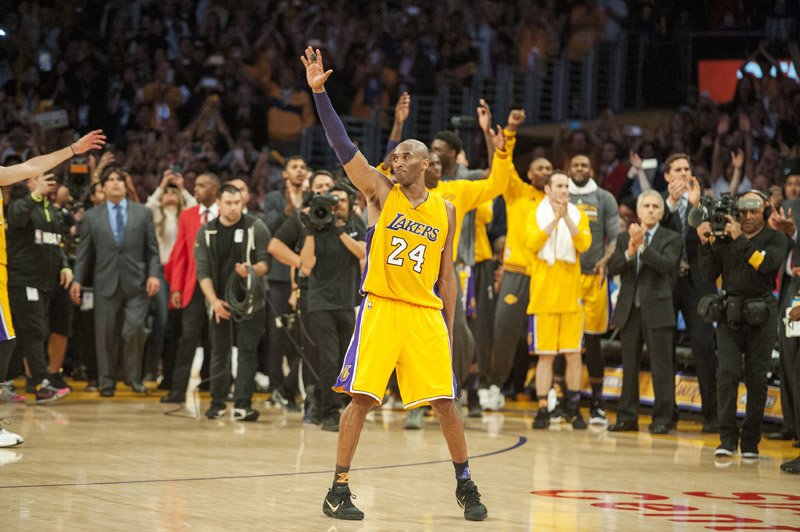 Los Angeles Lakers' forward Kobe Bryant acknowledges fans after his final NBA match against Utah Jazz in Los Angeles on Wednesday. Photo: AP