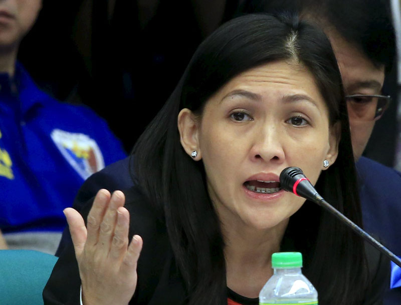 Maia Santos Deguito, branch manager of the Rizal Commercial Banking Corp (RCBC), answers questions during a money laundering hearing at Senate in Manila, on April 5, 2016. Photo: Reuters