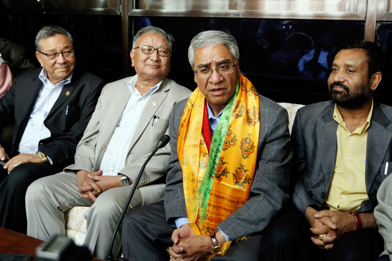 Nepali Congress President Sher Bahadur Deuba talks to journalists upon his arrival at the Tribhuvan International Airport from a 10-day India trip, in Kathmandu, on Wednesday, April 27, 2016. Photo: RSS
