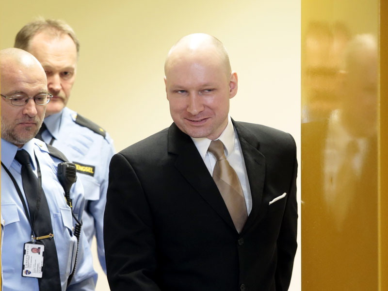 FILE - Anders Behring Breivik enters a courtroom in Skien, Norway, on Tuesday, March 15, 2016. Photo: Lise Aserud, NTB scanpix via AP