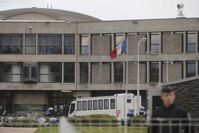 French gendarme and police stand at the entrance of the Fleury-Merogis prison near Paris after the arrival of a police convoy believed to be carrying Salah Abdeslam, believed to be the sole survivor among a group of Islamist militants who killed 130 people in Paris in November, France, April 27, 2016.      REUTERS/Christian Hartmann