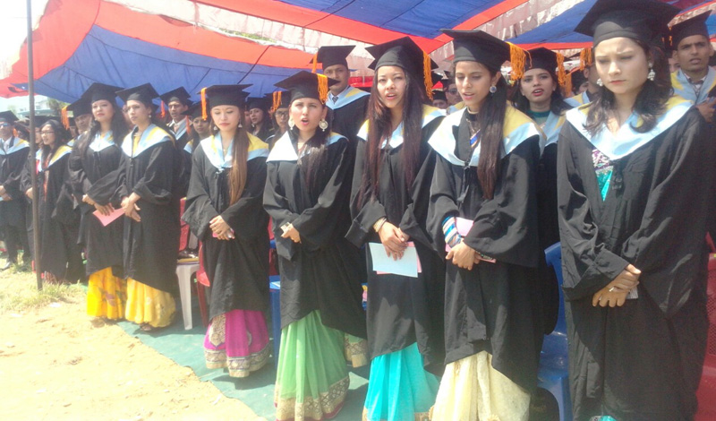 Graduates sing the national anthem during the 13th convocation ceremony of Pokhara University, in Lekhanath of Kaski, on Wednesday, April 20, 2016. Photo: Rup Narayan Dhakal