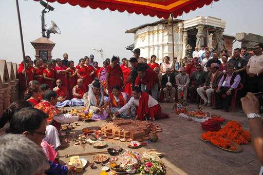 Prime Minister KP Sharma Oli (c) performs a ritual to initiate reconstruction work in Swayambhunath stupa in Kathmandu, Nepal, Monday, April 25, 2016. Photo: AP 