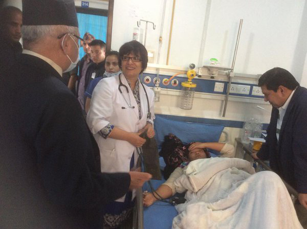 Prime Minister KP Sharma Oli visits Speaker Onsari Gharti, who is admitted at the Sumeru Hospital in Lalitpur, on Sunday, April 10, 2016. Photo: https://twitter.com/PM_Nepal/