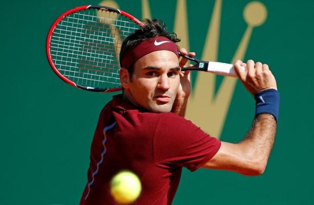 Tennis - Monte Carlo Masters - Monaco, 15/04/2016. Roger Federer of Switzerland plays a shot to Jo-Wilfried Tsonga of France .  REUTERS/Eric Gaillard