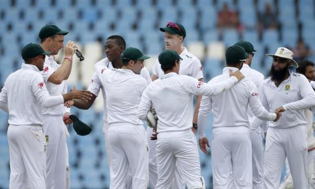 South Africa's team celebrates at the end of the fourth cricket test match against England at Centurion, South Africa, January 26, 2016. REUTERS/Siphiwe Sibeko/Files
