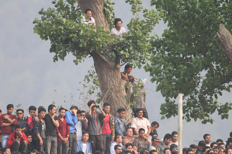 Spectators watching the ICC World Cricket League Championship third-round match between Nepal and Namibia at the Tribhuvan nUniversity Stadium in Kathmandu on Saturday. Nepal won the match by five wickets. Photo: Udipt Singh ChhetryTHT