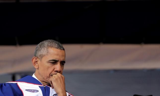 U.S. President Barack Obama waits to deliver the commencement address to the 2016 graduating class of Howard University in Washington, U.S., May 7, 2016. REUTERS/Joshua Roberts