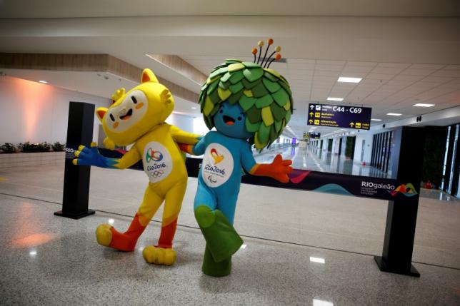 Olympic and Paralympic Games mascots Vinicius (L) and Tom pose during the opening ceremony of the new terminal at the international airport Galeao, which is expected to receive 1.5 million passengers during the 2016 Rio Olympics, in Rio de Janeiro, Brazil, May 19, 2016. REUTERS/Pilar Olivares