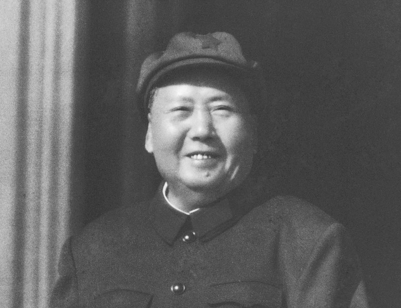 FILE - Former Chinese leader Mao Zedong observes Cultural Revolution inspired Red Guards assembled in Beijing's Tiananmen Square in 1966. Monday, May 16, 2016 marks the 50th anniversary of a 1966 party meeting that spearheaded the 10-year Cultural Revolution, a violent and frequently chaotic attempt by Mao to reassert his power and revive his party's egalitarian ideals. Photo: AP