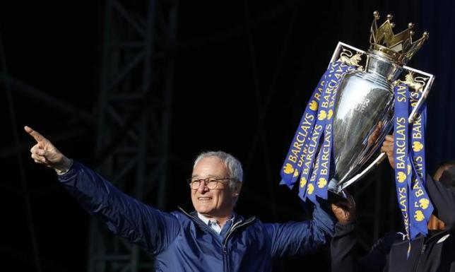 Britain Football Soccer - Leicester City - Premier League Title Winners Parade - Leicester City - 16/5/16nLeicester City manager Claudio Ranieri on the stage with the trophy during the parade nAction Images via Reuters / Carl Recine