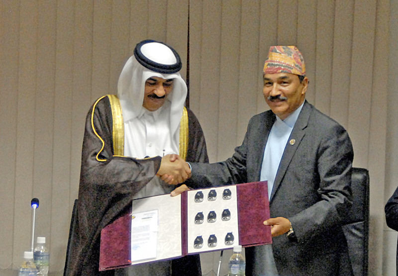 Ambassador of Qatar to Nepal, Ahmed Jaseem Mohamed Ali Al-Hamer, handing over the keys of cars to Deputy Prime Minister Kamal Thapa, in Kathmandu, on Wednesday, May 4, 2016. Photo: THT