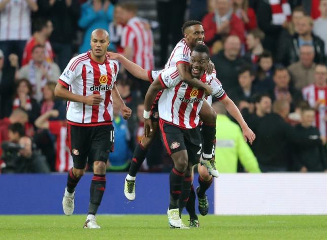 Britain Football Soccer - Sunderland v Everton - Barclays Premier League - The Stadium of Light - 11/5/16nLamine Kone celebrates scoring the third goal for Sunderland with Jermain Defoe and Younes KaboulnReuters / Russell CheynenLivepic