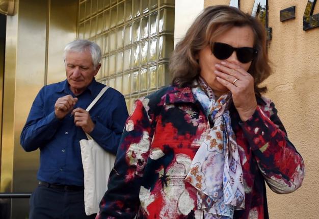 The parents of a victim from Malaysian Airlines Flight MH17 react as they leave the State Coroners Court, after the New South Wales State Coroner handed down his findings from an inquest into the deaths of six New South Wales residents who were aboard the plane, in Sydney, Australia, May 17, 2016.    AAP/Dean Lewins/via REUTERS