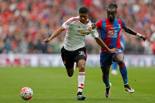 Britain Football Soccer - Crystal Palace v Manchester United - FA Cup Final - Wembley Stadium - 21/5/16nManchester United's Marcus Rashford in action with Crystal Palace's Pape SouarenAction Images via Reuters / John Sibley