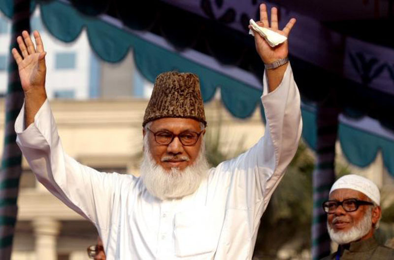 File - Moulana Motiur Rahman Nizami, chief of the Jamaat-e-Islami, Bangladesh's biggest Islamic Political Party and an alliance of the ruling Bangladesh Nationalist Party, waves to his supporters during a rally protesting against Western newspapers that published cartoons on Prophet Mohammed. Photo: Rafiqur Rahman/Reuters