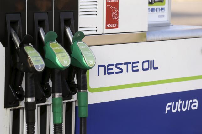 Fuel pumps are pictured at a Neste Oil gas station in Adazi, Latvia August 5, 2014. REUTERS/Ints Kalnins/File Photo