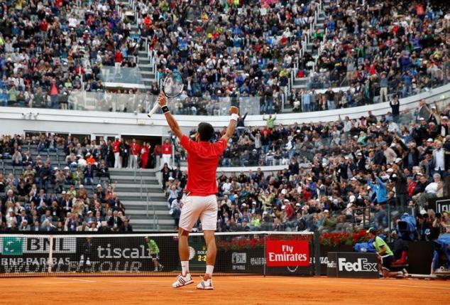 Tennis - Italy Open Men's Singles Quarterfinal match - Novak Djokovic of Serbia v Rafael Nadal of Spain - Rome, Italy - 13/5/16. Djokovic celebrates at the end of the match.  REUTERS/Alessandro Bianchi