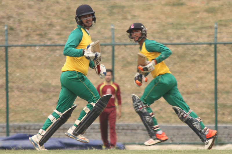 Subash Khakurel (left) and Sundeep Sunar of Sudur Paschimanchal Academy run between the wickets during their Expert College Premier League match against Platinum College in Kathmandu on Tuesday, May 3, 2016. Photo: Udipt Singh Chhetry / THT