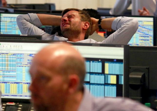 A trader from BGC, a global brokerage company in London's Canary Wharf financial centre reacts during trading June 24, 2016 after Britain voted to leave the European Union in the EU BREXIT referendum.    REUTERS/Russell Boyce