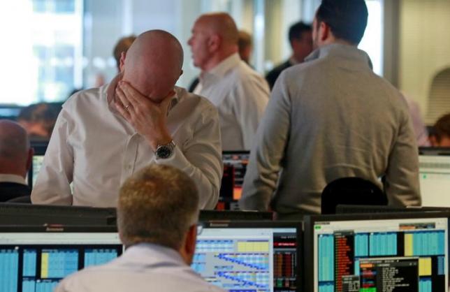 Traders from BGC, a global brokerage company in London's Canary Wharf financial centre react during trading June 24, 2016 after Britain voted to leave the European Union in the EU BREXIT referendum. REUTERS/Russell Boyce