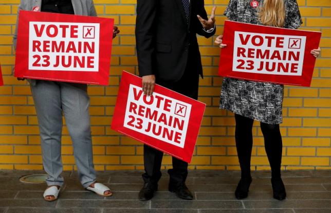 Local council leaders hold placards during a Vote Remain event at Manchester Metropolitan University's student Union in Manchester, northern England June 16, 2016. REUTERS/Phil Noble     TPX IMAGES OF THE DAY      - RTX2GIPV
