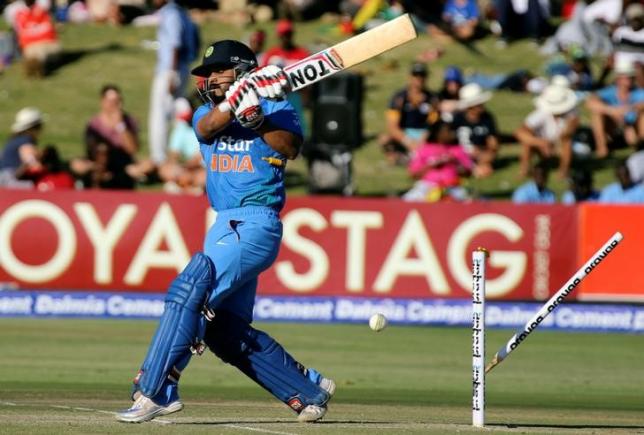 Cricket -  First T20 International - India v Zimbabwe - Harare, Zimbabwe - 18/06/16. India's Kedar Jadhav is bowled during their T20 cricket match against Zimbabwe. REUTERS/Philimon Bulawayo/Files