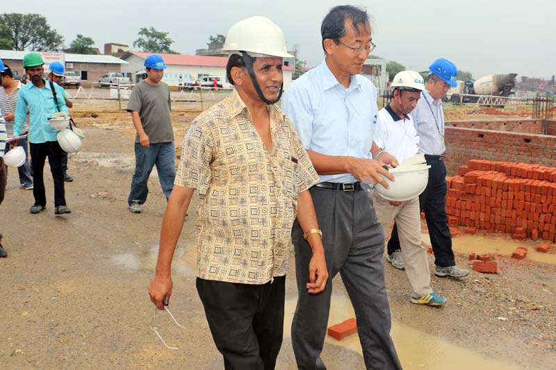 Asian Development Bank's Nepal Country Director Kenichi Yokohama inspects the under-construction Gautam Buddha International Airport with the project chief Om Sharma in Lumbini, on Sunday, June 26, 2016. Photo: RSS