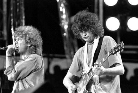 FILE - In this July 13, 1985 file photo, singer Robert Plant, left, and guitarist Jimmy Page of the British rock band Led Zeppelin perform at the Live Aid concert at Philadelphia's J.F.K. Stadium. Generations of aspiring guitarists have tried to copy the riff from Led Zeppelin's u201cStairway to Heaven.u201d Starting Tuesday, June 14, 2016, a Los Angeles court will try to decide whether the members of Led Zeppelin themselves ripped off that riff. Page and Plant are named as defendants in the lawsuit brought by the trustee of late guitarist Randy Wolfe from the band Spirit. AP