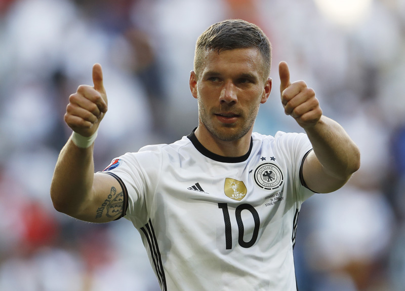 Germany's Lukas Podolski celebrates at the end of the match nagainst Slovakia of Euro 2016 Round of 16 soccer match at Stade Pierre-Mauroy, Lille in France, on Sunday, June 26, 2016. Photo: Reuters