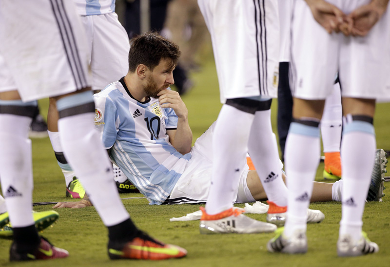 Argentina's Lionel Messi waits for trophy presentations after the Copa America Centenario championship soccer match, Sunday, June 26, 2016, in East Rutherford, New Jersey. Photo: AP