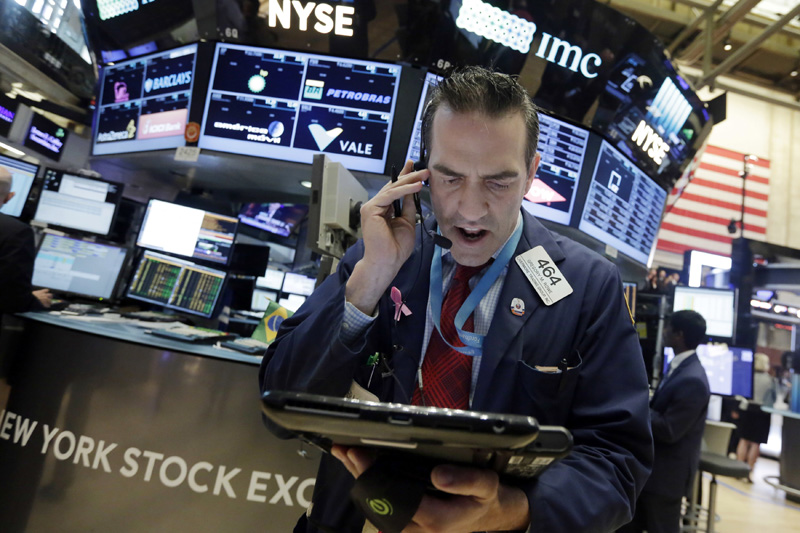 Trader Gregory Rowe works on the floor of the New York Stock Exchange, Monday, June 20, 2016. Photo: AP