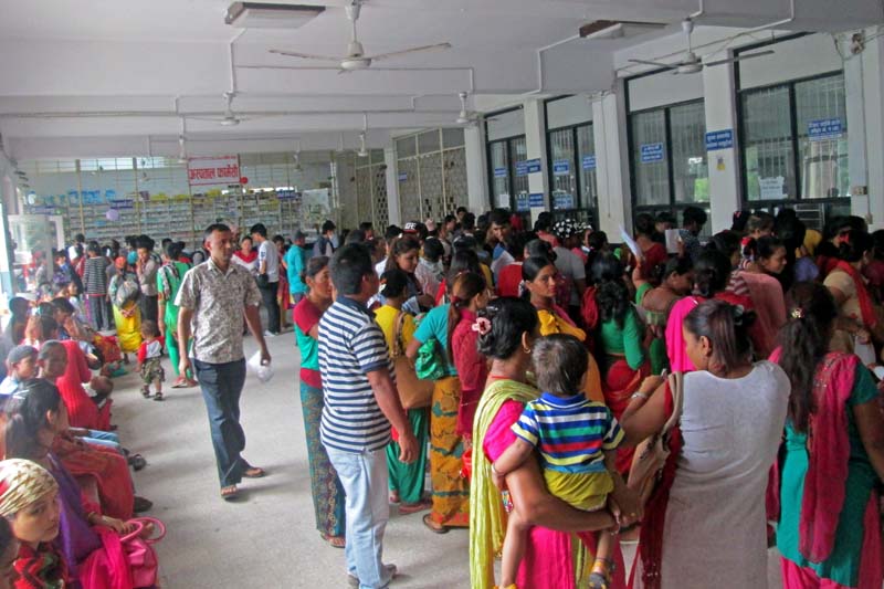 Long queues of patients await their turn to take tickets to meet the doctors at the Western Regional Hospital in Pokhara, on Monday, June 27, 2016. With the increase in temperature, number of patients has also increased. Photo: Rishi Ram Baral