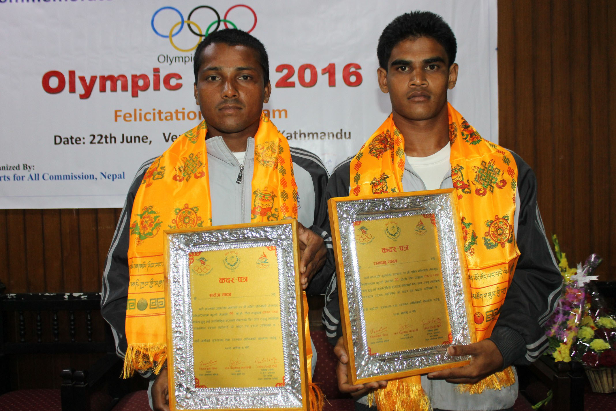 Nepal Wrestling Association honour the bronze medal winning wrestlers Ram Babu Yadhav (60kg) and Saroj Yadhav (65kg) of the 12th South Asian Games here on Wednesday, June 22, 2016.