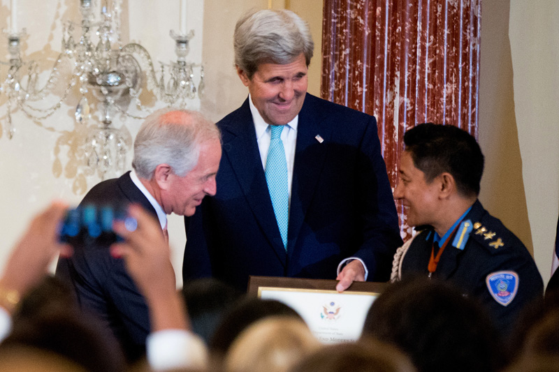 US Secretary of State John Kerry (centre), and Senator Bob Corker (left) congratulate Nepal Police SP Kiran Bajracharya as she is recognised as a '2016 Trafficking in Persons Report Hero' whose efforts have made an impact on the global fight against modern slavery, Thursday, June 30, 2016. Photo: AP