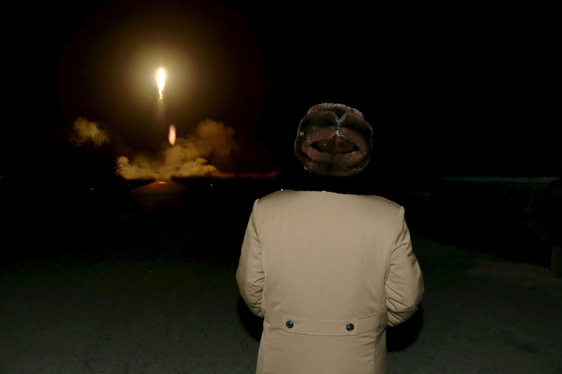 FILE PHOTO: North Korean leader Kim Jong Un watches the ballistic rocket launch drill of the Strategic Force of the Korean People's Army (KPA) at an unknown location, in this undated file photo released by North Korea's Korean Central News Agency (KCNA) in Pyongyang on March 11, 2016.  Photo: REUTERS/File