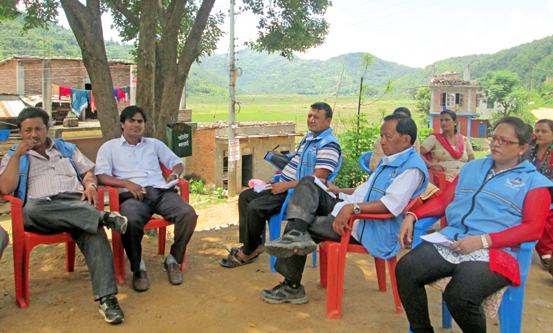 A projects monitoring team of the Ministry for Peace and Reconstruction taking information from locals during inspection, at Byas Municipality, Tanahun, on Wednesday, June 29, 2016. Photo: THT