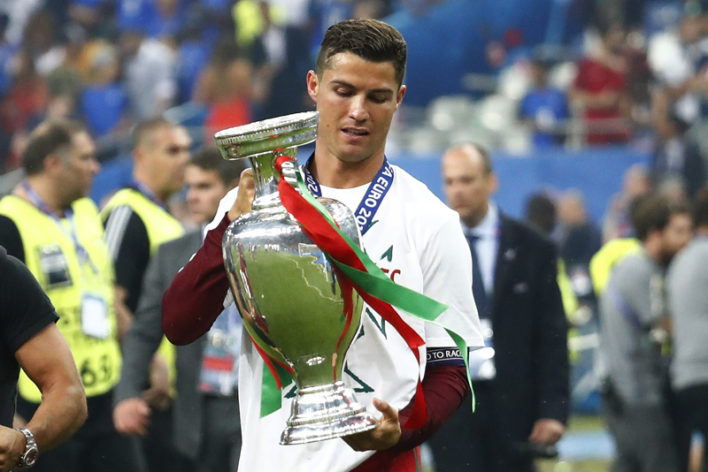 Portugal's Cristiano Ronaldo celebrates with the trophy after winning Euro 2016n at Stade de France, in Paris on Sunday, July 10, 2016. Photo: Reuters