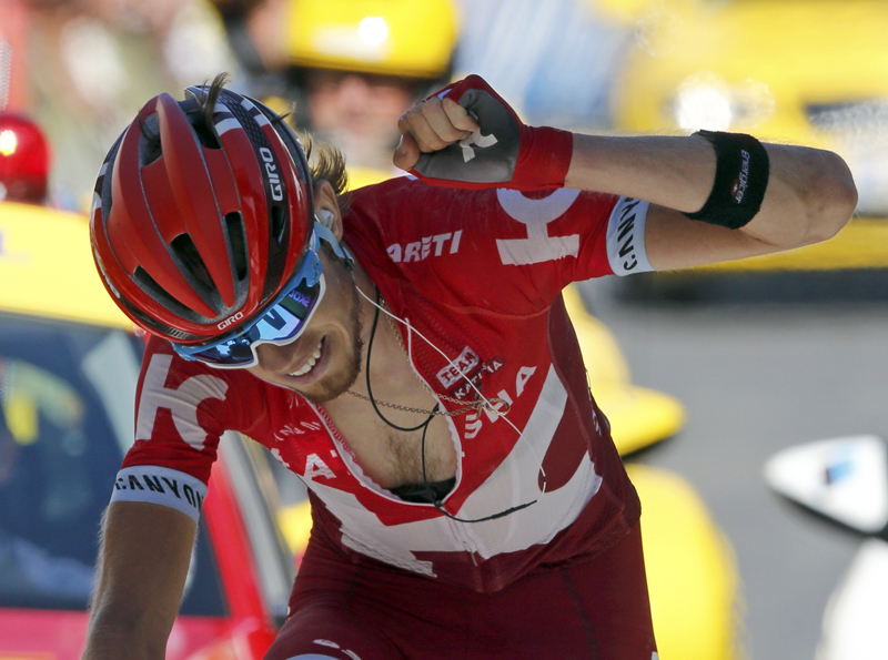 Team Katusha rider Ilnur Zakarin of Russia celebrates as he crosses the finish line to win the 17th stage of the Tour de France cycling race in nFinhaut-Emosson on Wednesday, July 20, 2016. Photo: Reuters