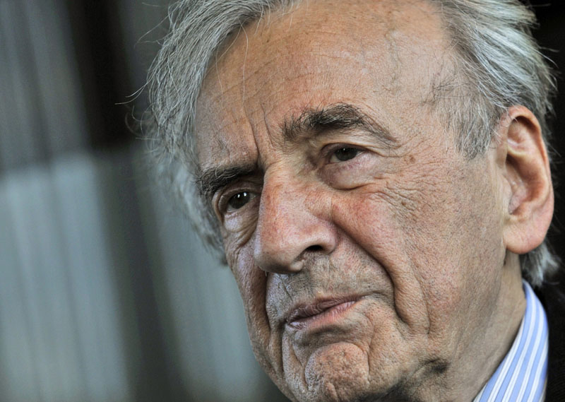 Elie Wiesel listens during an interview with The Associated Press in Budapest, Hungary.  Wiesel, the Nobel laureate and Holocaust survivor has died.  His death was announced Saturday, July 2, 2016  by Israel's Yad Vashem Holocaust Memorial. Photo:  AP/File