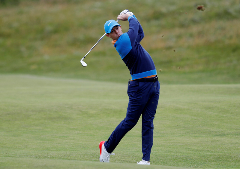 Rory McIlroy of Northern Ireland in action on the sixth hole, during the British Open, Practice Round at Royal Tron, in Scotland, on Tuesday, July 12, 2016. Photo: Reuters