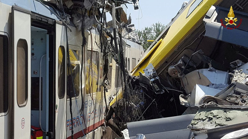 Two passenger trains are seen after a collision in the middle of an olive grove in the southern village of Corato, near Bari, Italy, in this handout picture released by Italian Firefighters July 12, 2016. Via Reuters