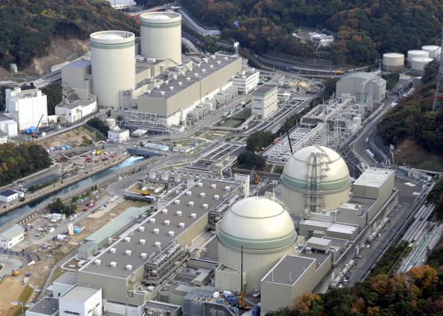 An aerial view shows No. 4 (front L), No. 3 (front R), No. 2 (rear L) and No. 1 reactor buildings at Kansai Electric Power Co.'s Takahama nuclear power plant in Takahama town, Fukui prefecture, in this photo taken by Kyodo November 27, 2014.    Kyodo/File Photo via REUTERS