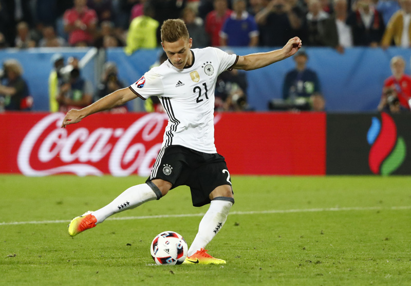 Germany's Joshua Kimmich scores in the penalty shootoutn. Photo: Reuters