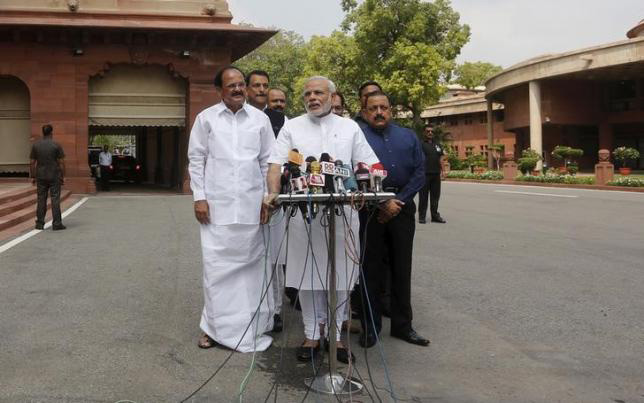 Prime Minister Narendra Modi (C) speaks to the media on the opening day of the monsoon session of parliament in New Delhi, India, July 21, 2015./File photo: Reuters