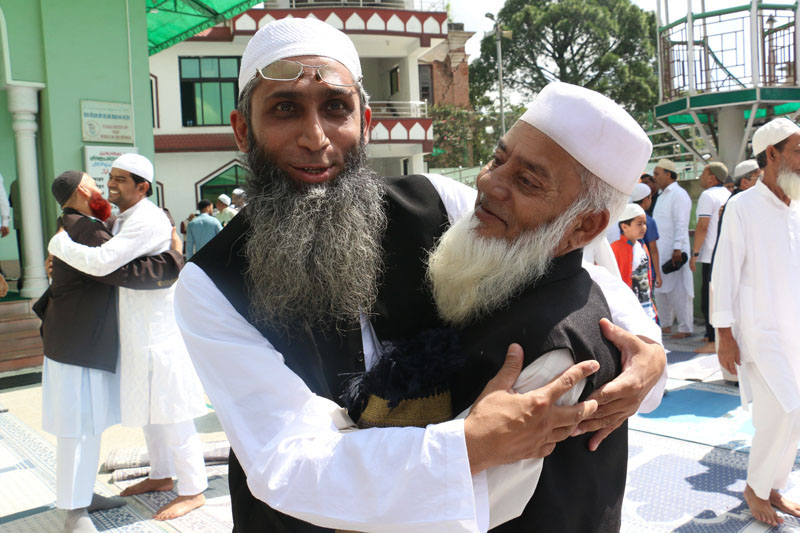 Muslims exchange greetings on the occasion of Eid al-Fitr holiday, which marks the end of the Muslim fasting month of Ramadan, at Jame mosque, in Ghantaghar, Kathmandu, on July 7, 2016. Photo: RSS