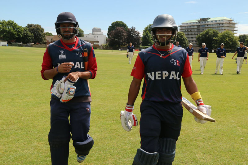 Raju Rijal and Binod Bhandari walk out after the end of first inning during the match between Nepal and Eastbourne Cricket Club at the Saffrons on Sunday July 17, 2016. Photo: Raman Siwakoti